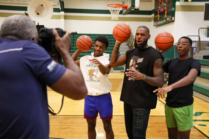 LeBron James and his sons pose for a photo